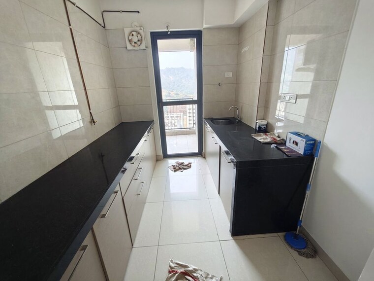Kitchen, godrej-city-panvel-phase-1 2 Bedroom 720 Sq.Ft. Apartment In Poyanje Navi Mumbai 10493404