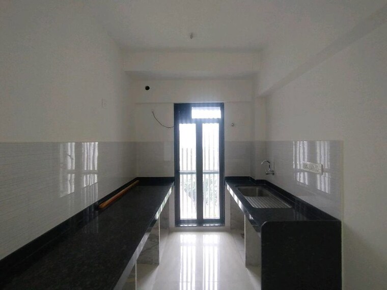 Kitchen, rustomjee-bella-phase-1 2 Bedroom 900 Sq.Ft. Apartment In Bhandup West Mumbai 10493449