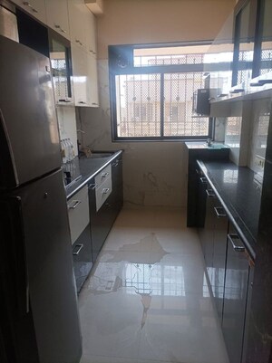 Kitchen in 2 BHK Apartment at Tilak Nagar – for Sale