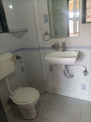 Bathroom in 2 BHK Apartment at Tilak Nagar – for Sale
