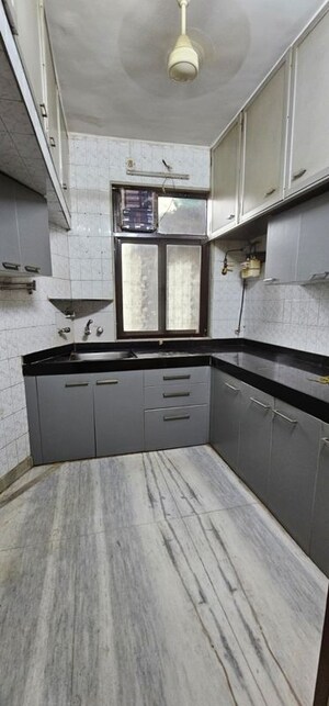 Kitchen in 2 BHK Apartment at Sunder Jamnotri CHS, Malad West – for Rent