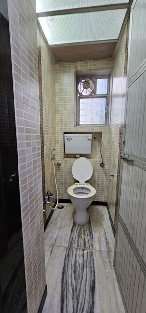 Bathroom in 2 BHK Apartment at Sunder Jamnotri CHS, Malad West – for Rent