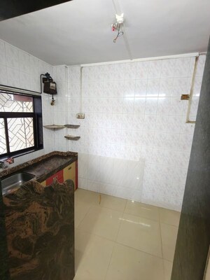 Bathroom in 1 BHK Apartment at Asmita Jyoti CHS, Malad West – for Rent