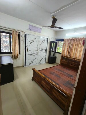 Bedroom in 1 BHK Apartment at Asmita Jyoti CHS, Malad West – for Rent