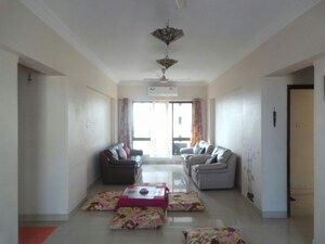 Living Room in 2 BHK Apartment at Lokhandwala Residency, Worli – for Sale