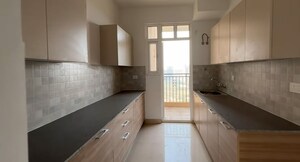 Kitchen in 3 BHK Apartment at ATS Homekraft Pious Hideaways, Sector 150 – for Sale