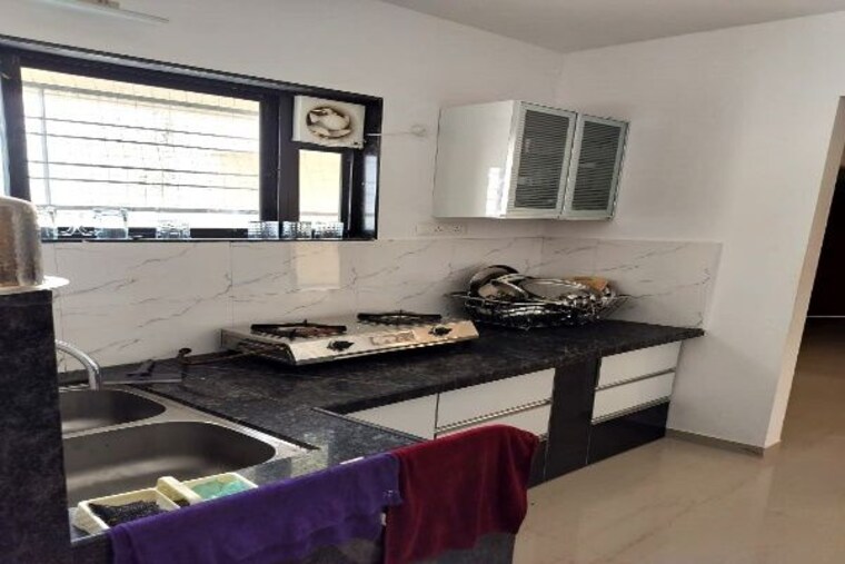 Kitchen, supertech-defence-colony-phase-iv 1 Bedroom 640 Sq.Ft. Apartment In Wagholi Pune 10493693