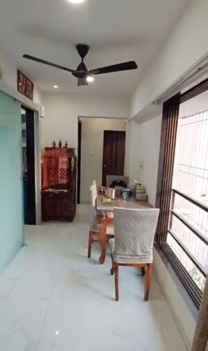Living Room in 1 BHK Apartment at Sudarsan Panchsheel, Andheri East – for Sale