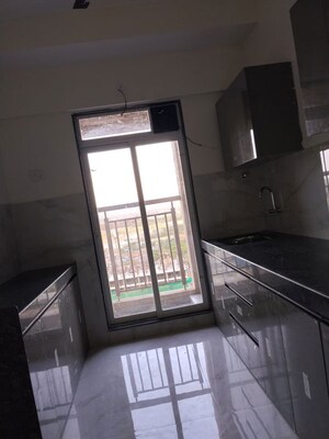 Kitchen in 1 BHK Apartment at Anant Metropolis Insignia Towers, Kasarvadavali – for Rent