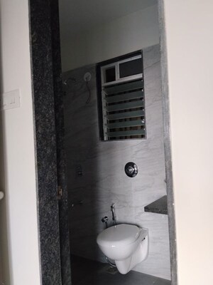 Bathroom in 1 BHK Apartment at Anant Metropolis Insignia Towers, Kasarvadavali – for Rent