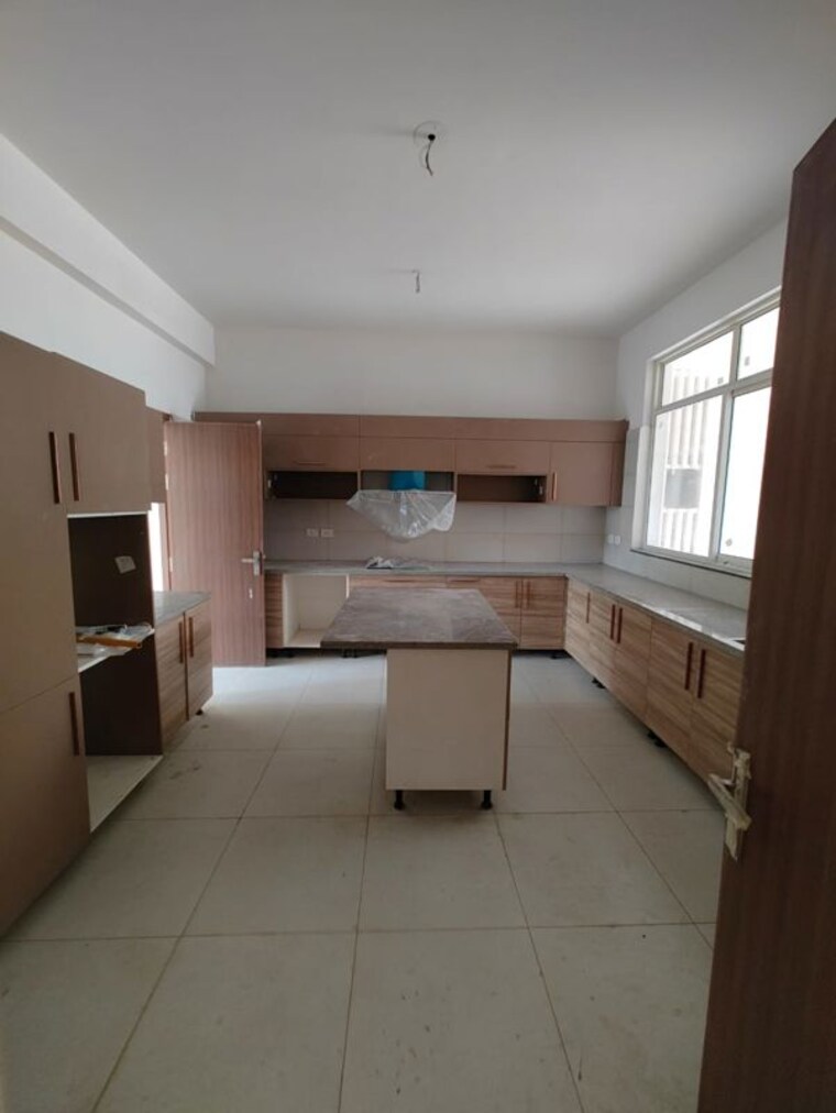 Kitchen, godrej-golf-links-exquisite 4 Bedroom 2300 Sq.Ft. Villa In Sector 27 Yamuna Expressway Greater Noida 10493933