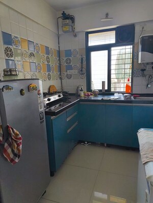 Kitchen in 1 BHK Apartment at Raunak Heights, Ghodbunder Road – for Rent