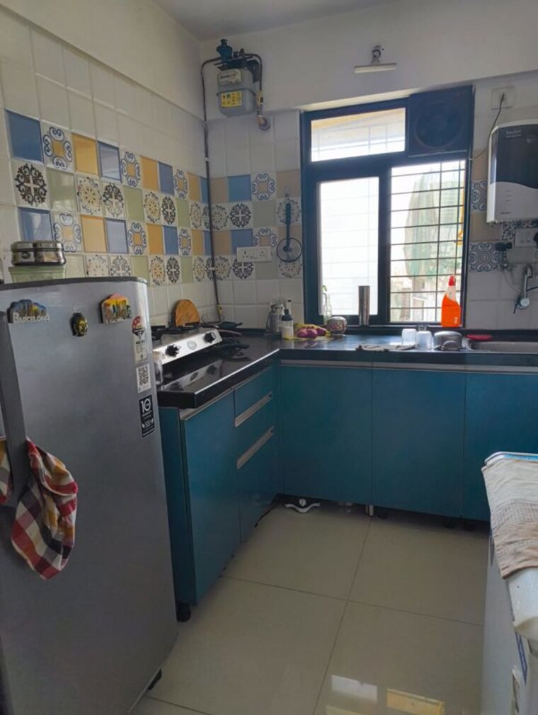 Kitchen, raunak-heights 1 Bedroom 400 Sq.Ft. Apartment In Ghodbunder Road Thane 10493970