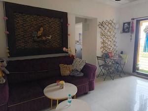 Living Room in 1 BHK Apartment at Raunak Heights, Ghodbunder Road – for Rent