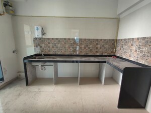 Kitchen in 2 BHK Apartment at Rajesh Raj Infinia, Malad West – for Rent