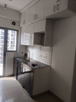 Kitchen in 2.5 BHK Apartment at Gulshan Bellina, Sector 16 Greater Noida – for Rent