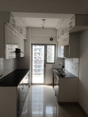 Kitchen in 2.5 BHK Apartment at Gulshan Bellina, Sector 16 Greater Noida – for Rent