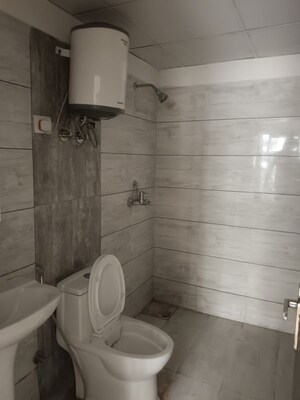 Bathroom in 2.5 BHK Apartment at Gulshan Bellina, Sector 16 Greater Noida – for Rent