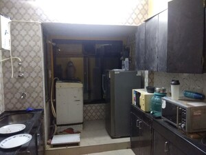 Kitchen in 2 BHK Apartment at Maharaja Retreat CHS, Goregaon East – for Rent