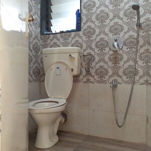 Bathroom in 2 BHK Apartment at Maharaja Retreat CHS, Goregaon East – for Rent