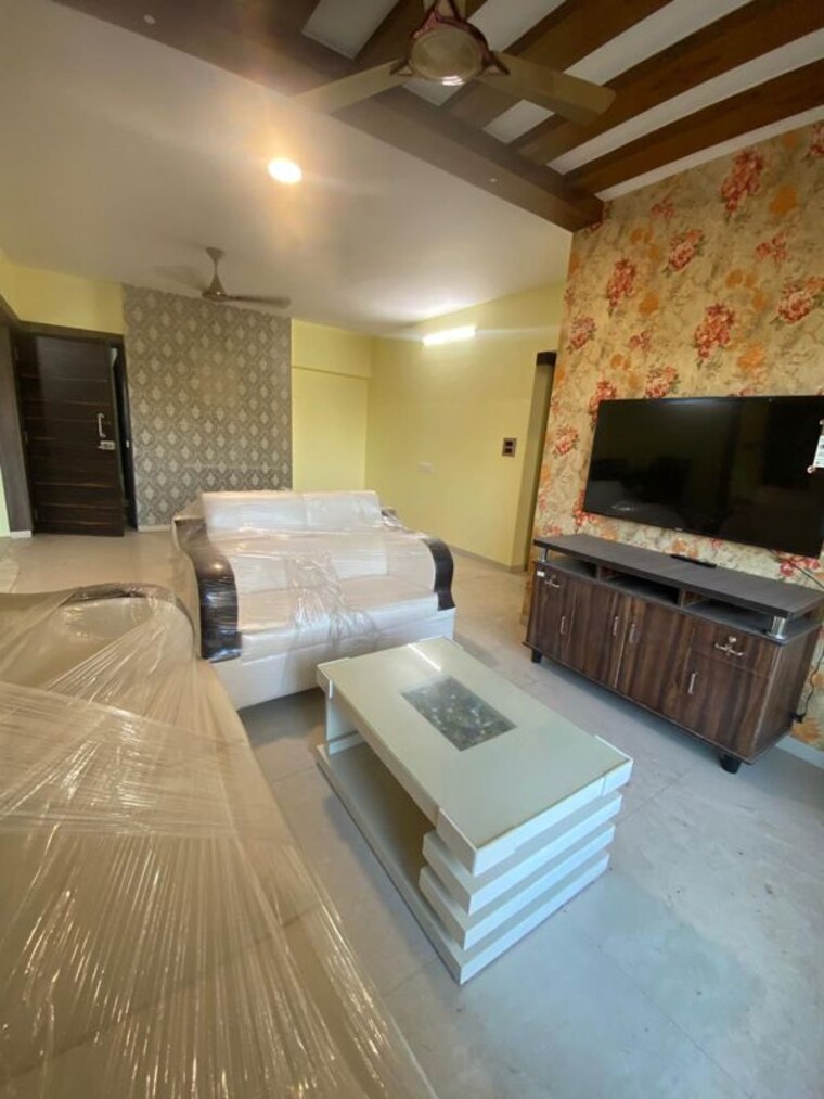 Living Room, mantri-serene 2 Bedroom 905 Sq.Ft. Apartment In Goregaon East Mumbai 10494255