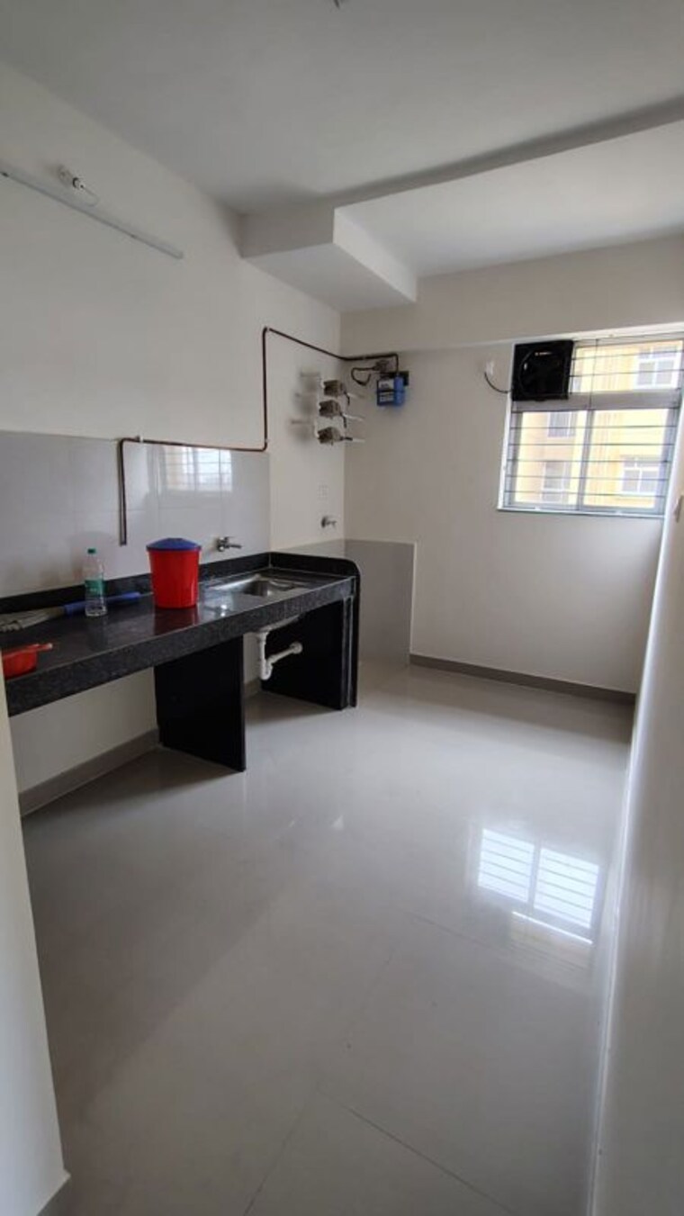 Kitchen, magarpatta-riverview-city-hornbill-heights 1 Bedroom 500 Sq.Ft. Apartment In Loni Kalbhor Pune 10494284
