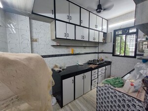 Kitchen in 2 BHK Apartment at Malad Gokul CHS, Malad West – for Rent