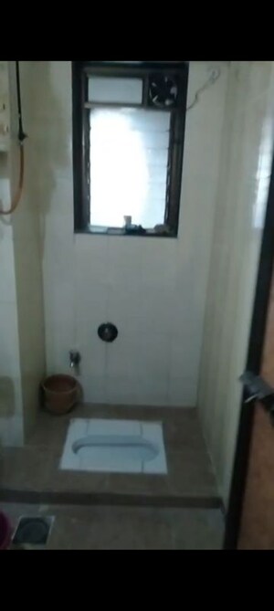 Bathroom in 2 BHK Apartment at Mitha Nagar – for Sale