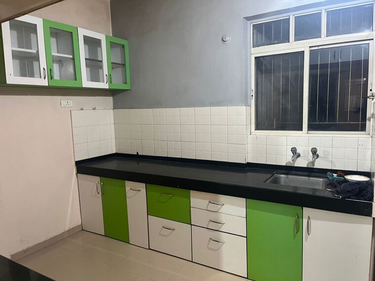 Kitchen, kolte-patil-dew-drops 2 Bedroom 1100 Sq.Ft. Apartment In Vishrantwadi Pune 10494523