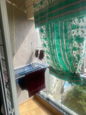 Living Room in 2 BHK Apartment at Choice Goodwill Breeza, Dhanori – for Rent