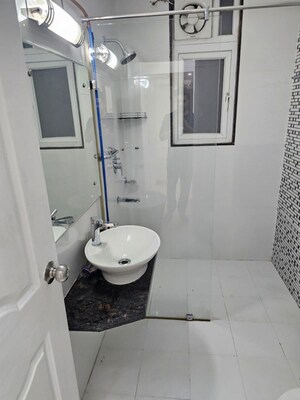 Bathroom in 2 BHK Apartment at Chandra Panorama, Sushant Golf City – for Rent