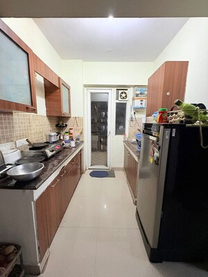 Kitchen in 2 BHK Apartment at Trident Embassy, Sector 1 Greater Noida – for Rent