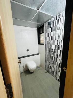 Bathroom in 2 BHK Apartment at Kohinoor Courtyard One, Wakad – for Rent