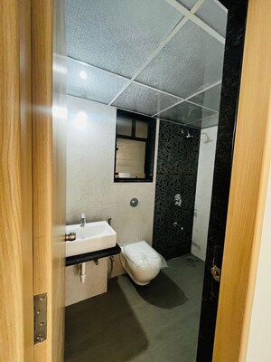 Bathroom in 2 BHK Apartment at Kohinoor Courtyard One, Wakad – for Rent