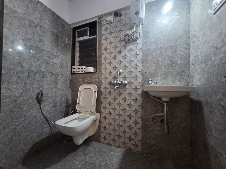 Bathroom, dgs-sheetal-standard-batteries 1 Bedroom 400 Sq.Ft. Apartment In Malad East Mumbai 10494723