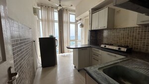 Kitchen in 2 BHK Apartment at Jaypee Greens Pavilion Court, Sector 128 – for Rent