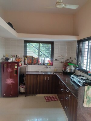 Kitchen in 4 BHK Villa at Prahlad Nagar – for Sale