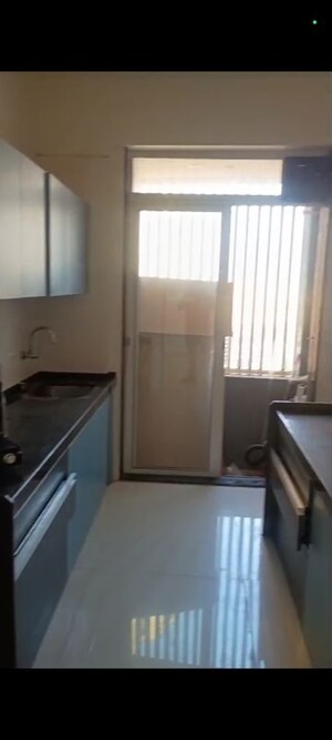 Kitchen in 2 BHK Apartment at Shreeji Atlantis, Malad West – for Rent