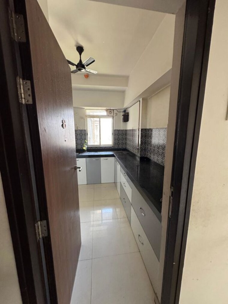 Kitchen, lodha-amara 2 Bedroom 735 Sq.Ft. Apartment In Kolshet Road Thane 10495742
