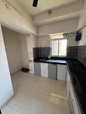 Kitchen in 2 BHK Apartment at Lodha Amara, Kolshet Road – for Sale