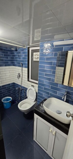 Team Area in 2 BHK Apartment at Rukhmini CHS, Andheri West – for Rent