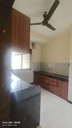 Kitchen in 2 BHK Apartment at Runwal Eirene, Balkum Pada – for Rent
