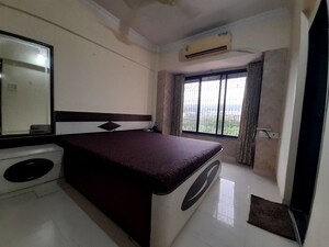 Living Room in 1 BHK Apartment at Doordarshan CHS, Goregaon East – for Rent