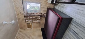 Living Room in 1 BHK Apartment at Malad Apartment, Malad West – for Rent
