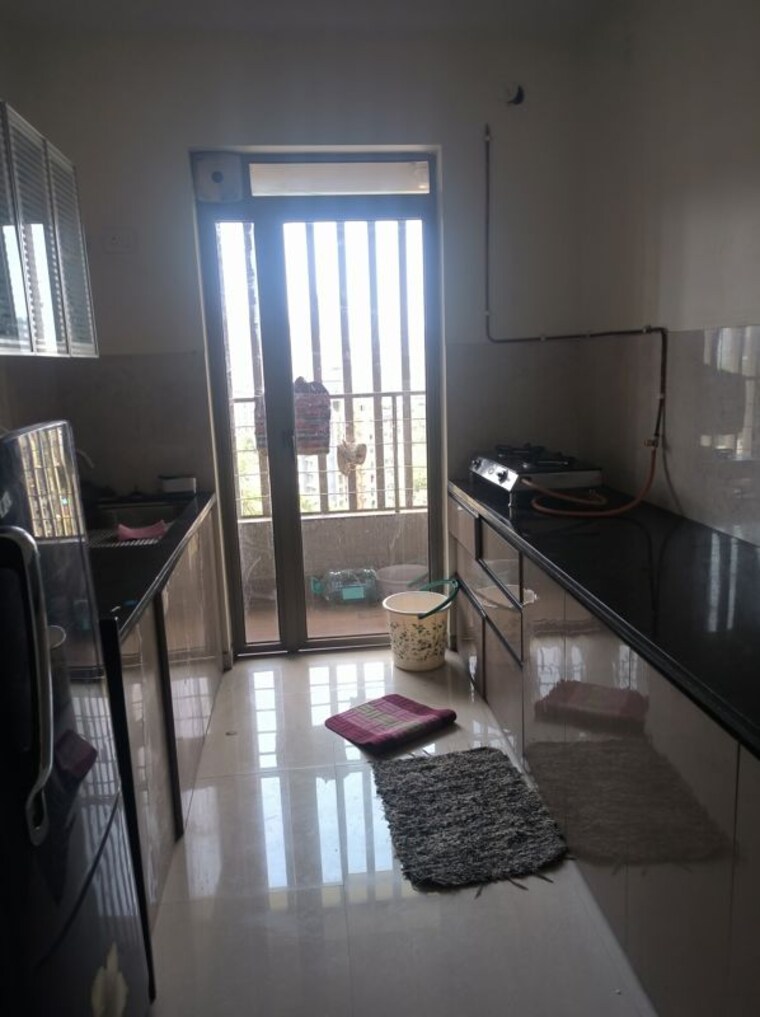 Kitchen, kalpataru-paramount-a 2 Bedroom 711 Sq.Ft. Apartment In Kapur Bawdi Thane 10495785