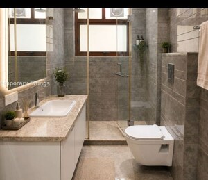 Bathroom in 3 BHK Builder Floor at Sarvodaya Enclave – for Sale
