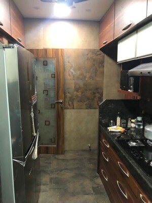 Kitchen in 3 BHK Apartment at Link Garden, Andheri West – for Sale
