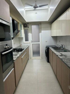 Kitchen in 3 BHK Apartment at DLF Park Place, Sector 54 – for Sale