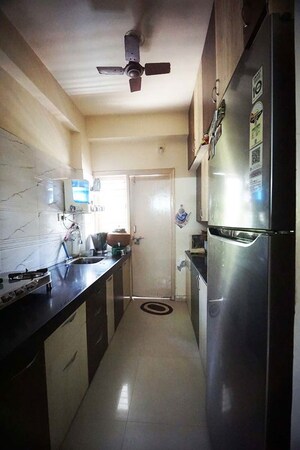 Kitchen in 2 BHK Apartment at Nava Naroda – for Sale