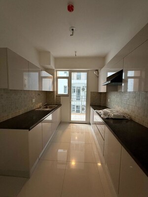 Kitchen in 4 BHK Apartment at Godrej Woods, Sector 43 – for Rent